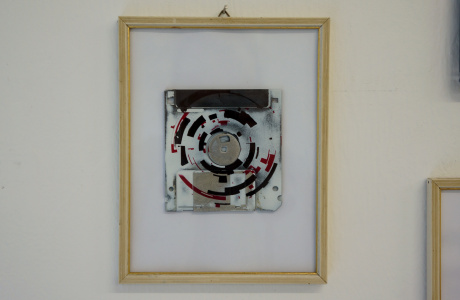 the circles, a silk screen on 3.5" floppy disks art