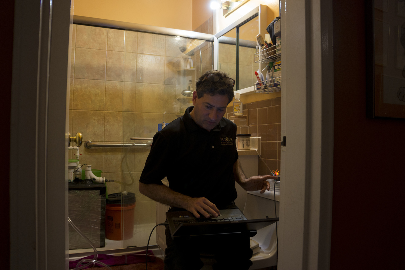 A professor checking his invention at the bath room