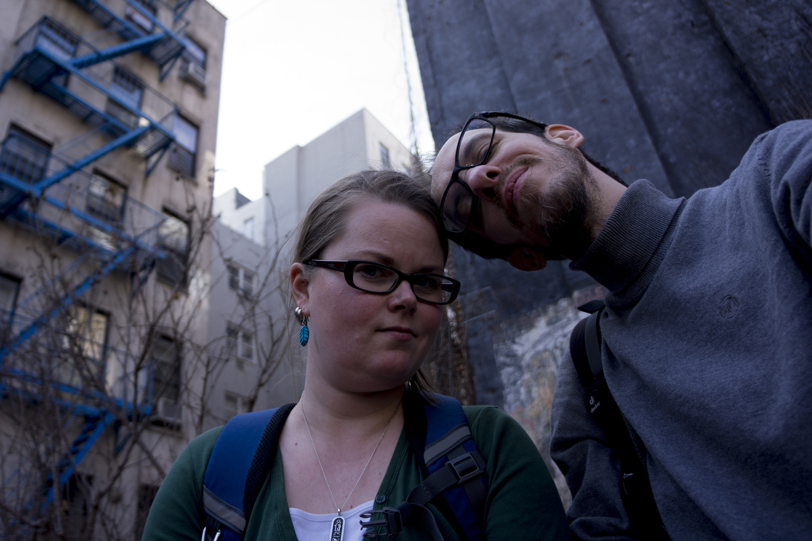 A couple sitting in garden at the east village in New York, USA