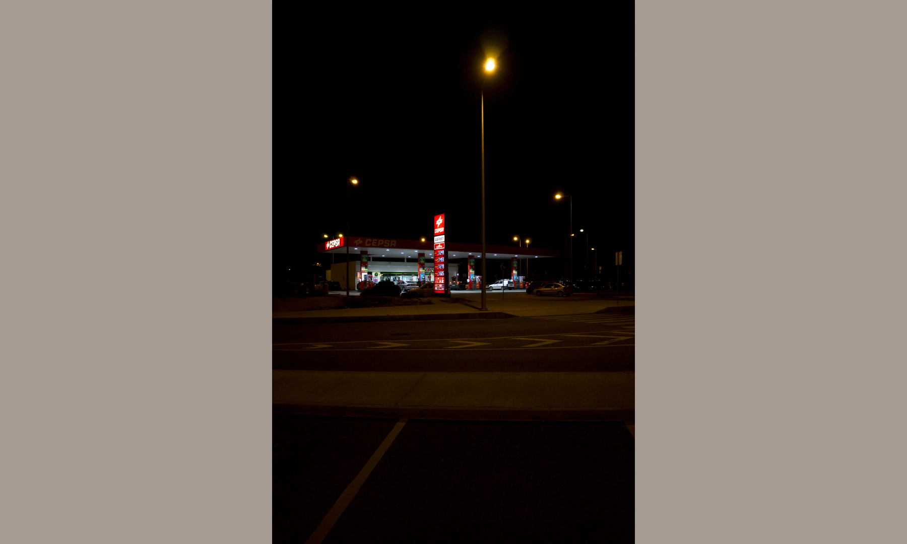 A gas station at night opposite to the airport faro, Portugal