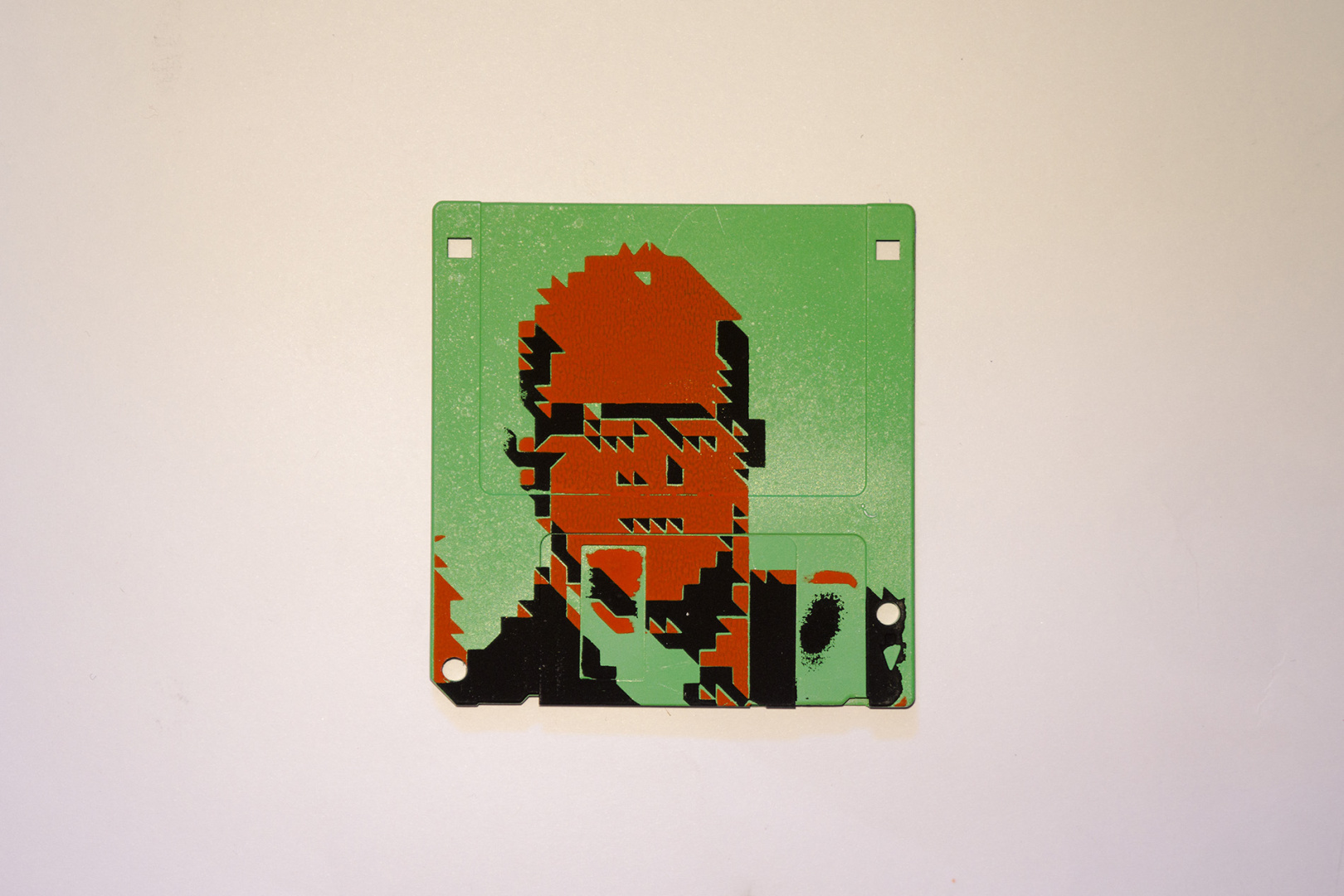 Silkscren of Klaus on a 3.5" floppy disk. Contemporary artwork - dark green version