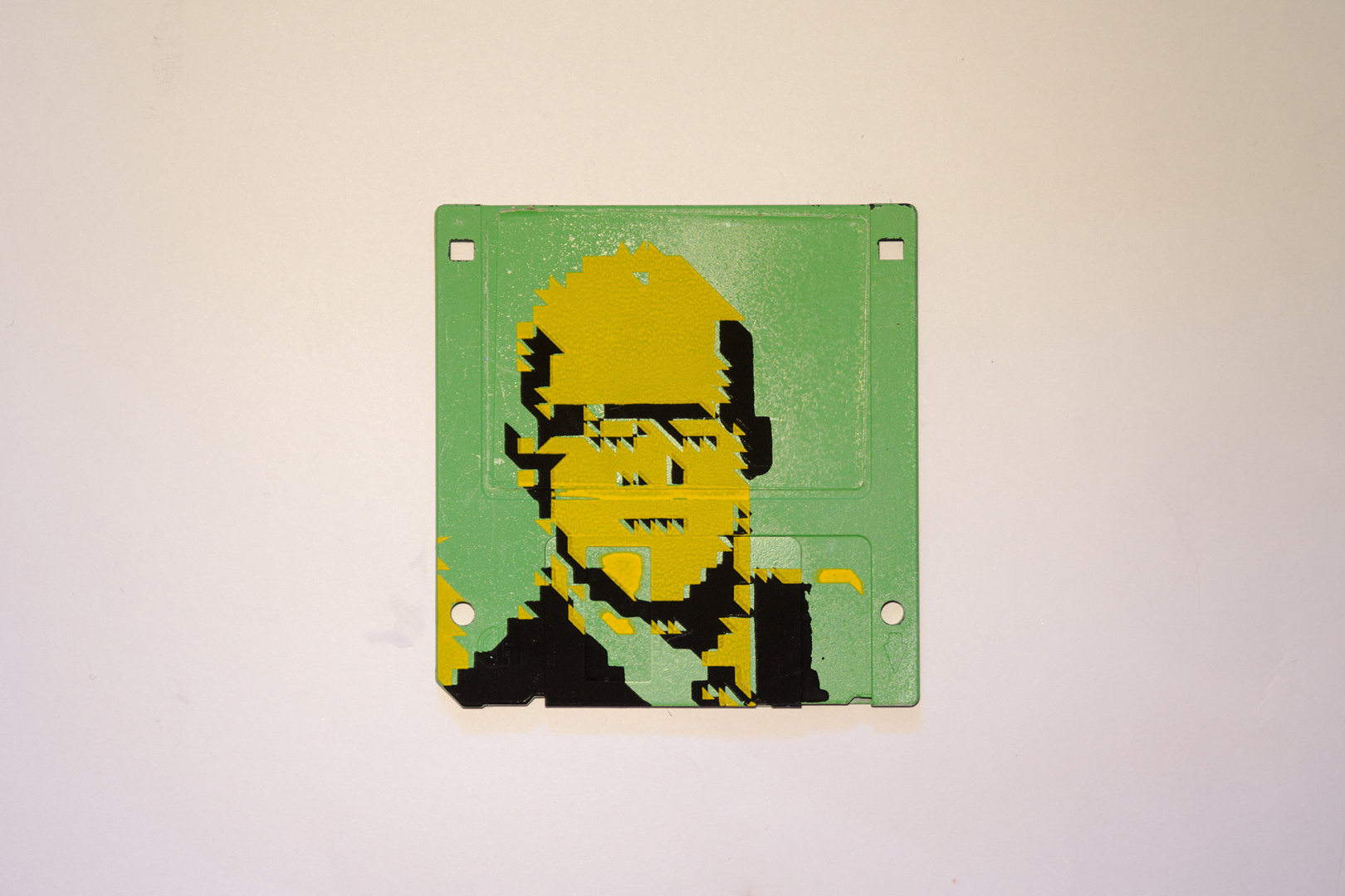 Silkscren of Klaus on a 3.5" floppy disk. Contemporary artwork - yellow version