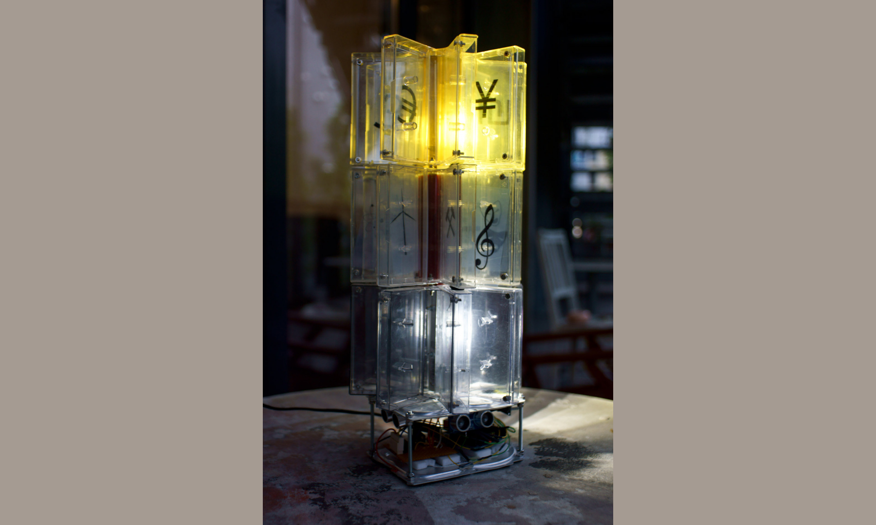 old mc cases made a lamp - interactive sculpture made of abandoned materials