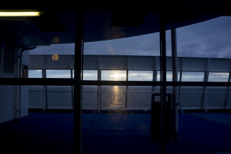 Sundown on top of a ferry