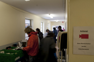 People looking for books at the book thrift of the animal shelter in Essen, Germany People looking for books at the book thrift of the animal shelter in Essen, Germany