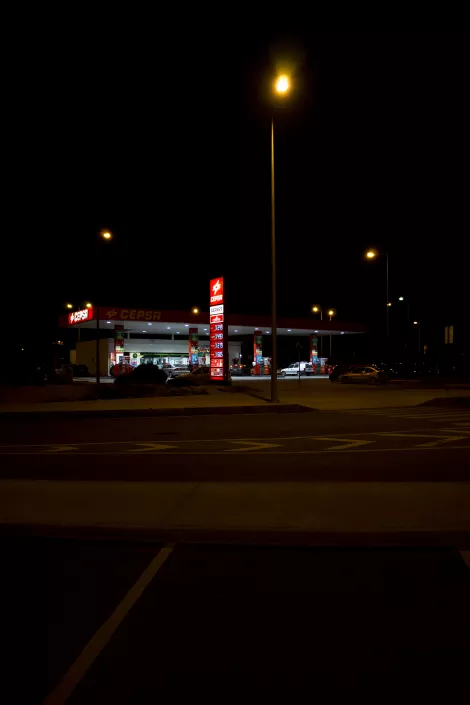 A gas station at night opposite to the airport faro, Portugal
