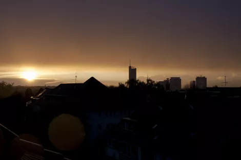 Sundown in Essen showing RWE Tower, Evonic