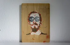 my face II inspired by batous eyes - modern artwork on easel